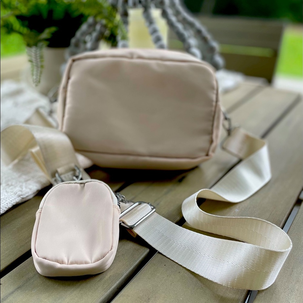 Cross body bag with small accessory pouch